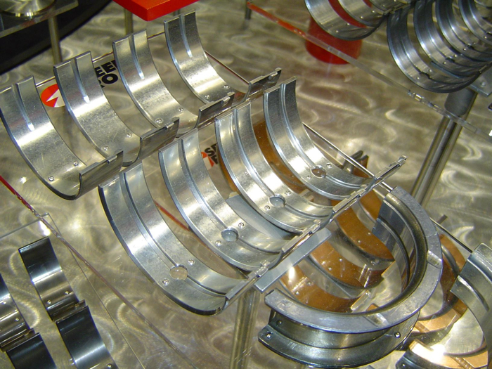 Racing bearings have different design features than stock bearings. This may include special oil grooving, edge chamfers and greater eccentricity (courtesy of Speed-Pro)